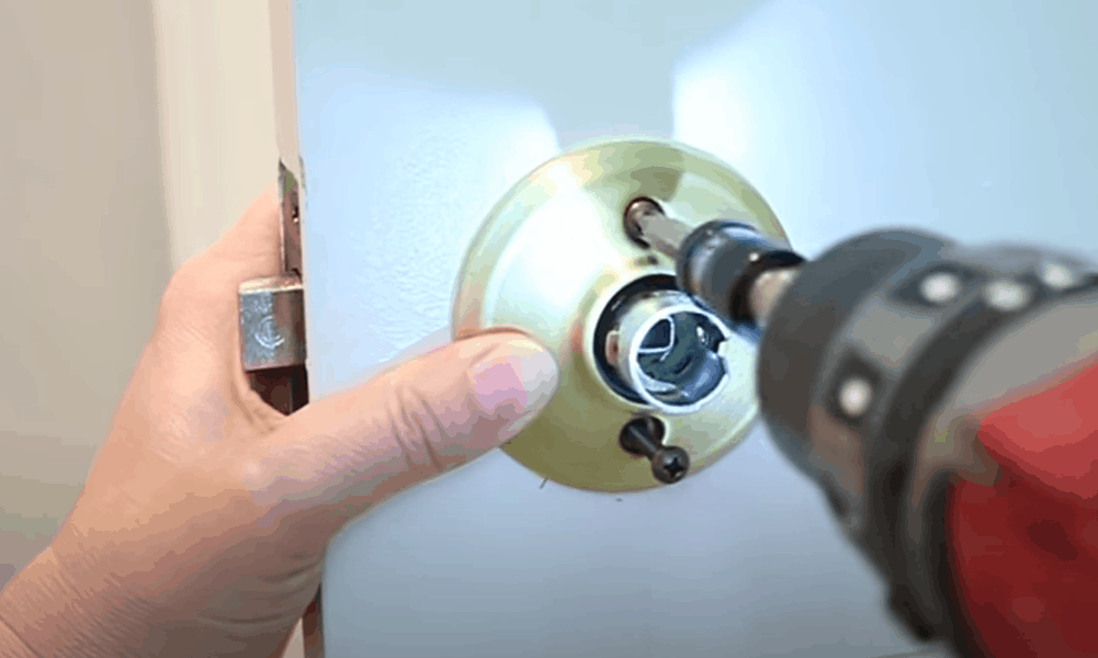 Affix both doorknob ends with screws