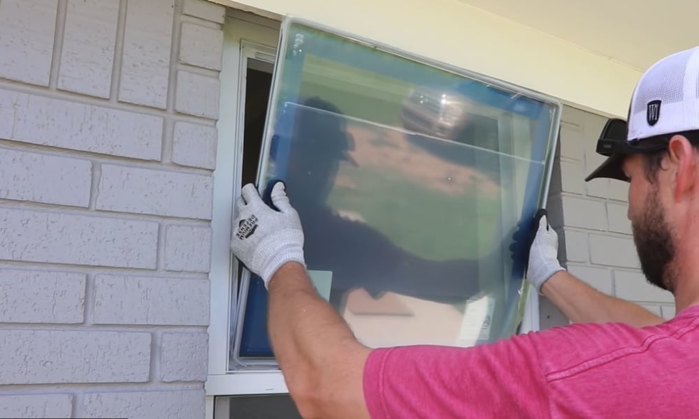 Fix in the New Energy-Efficient Glass Pane ad Apply New Caulking to Hold
