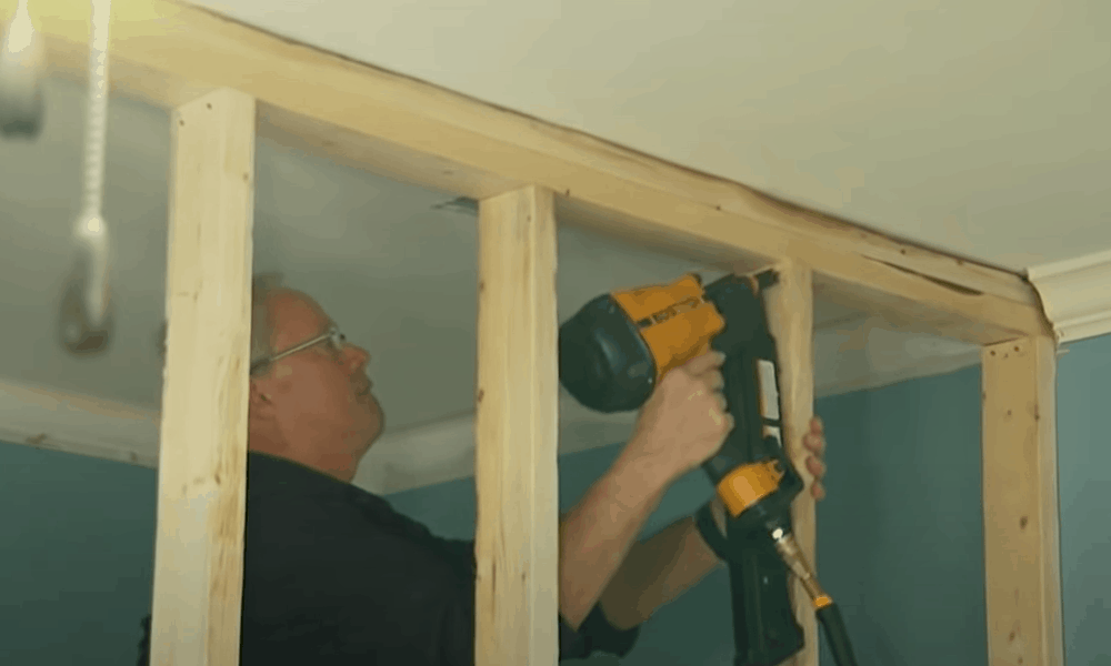 Position and secure the wall frame